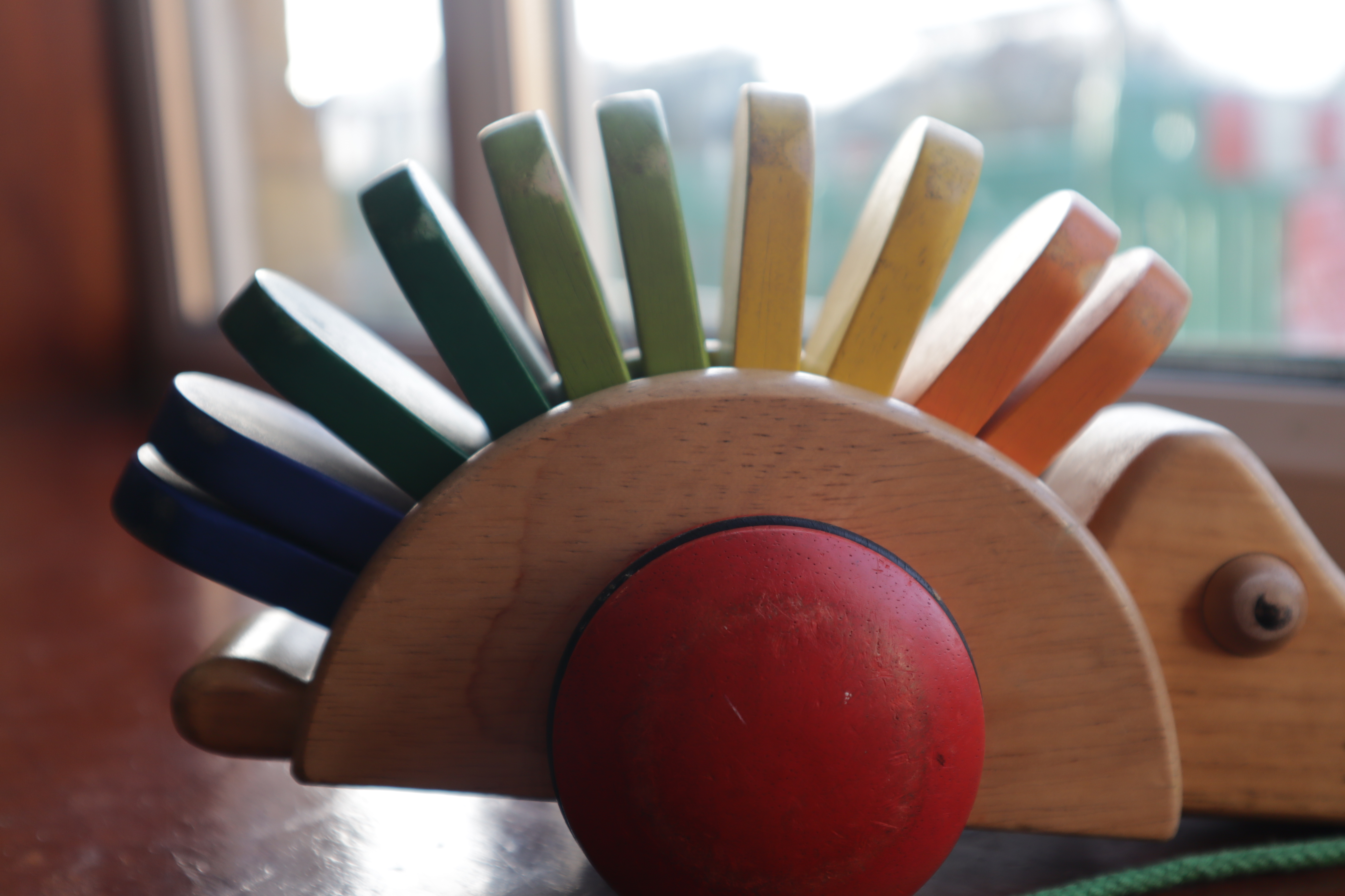 Young mums chatting together in a YMCA common room